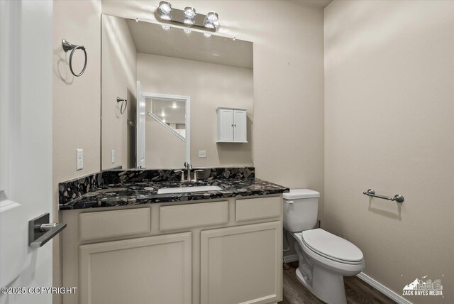 2987 Morgan Loop, Anchorage, AK 99516 - half bath with vanity and wood finished floors