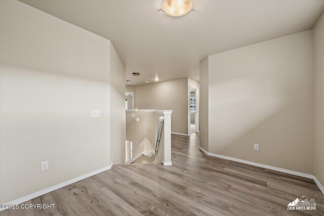 2987 Morgan Loop, Anchorage, AK 99516 - unfurnished room with wood finished floors and recessed lighting