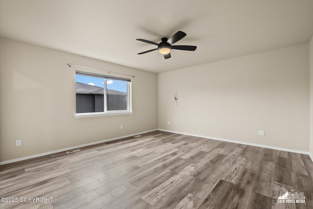 2987 Morgan Loop, Anchorage, AK 99516 - unfurnished room with wood finished floors and a ceiling fan