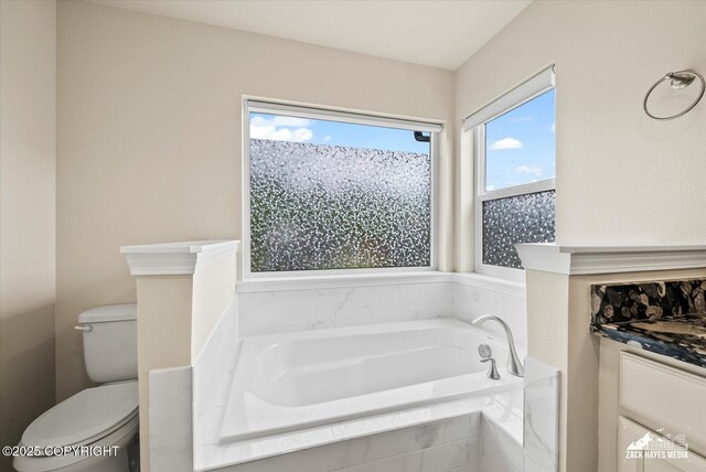 2987 Morgan Loop, Anchorage, AK 99516 - full bathroom featuring a garden tub and toilet