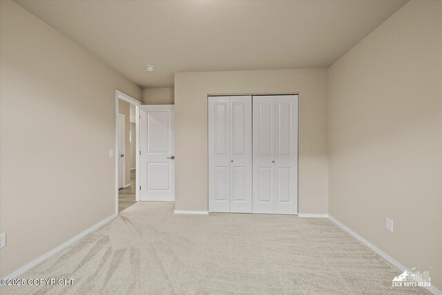 2987 Morgan Loop, Anchorage, AK 99516 - unfurnished bedroom with carpet floors and a closet