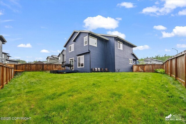2987 Morgan Loop, Anchorage, AK 99516 - back of house with a fenced backyard