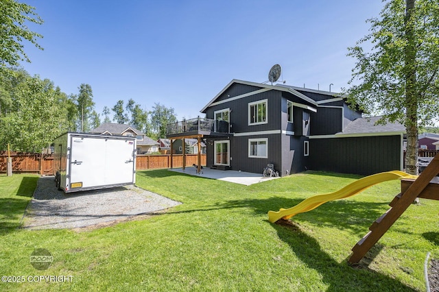 13378 Rosser Dr, Eagle River, AK 99577 - rear view of house featuring a patio area, a fenced backyard, a shed, and a playground