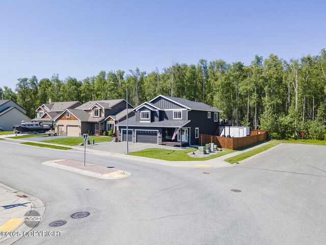 13378 Rosser Dr, Eagle River, AK 99577 - view of front of house featuring a residential view and concrete driveway