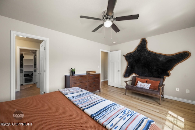 13378 Rosser Dr, Eagle River, AK 99577 - bedroom featuring wood finished floors, a spacious closet, and ceiling fan