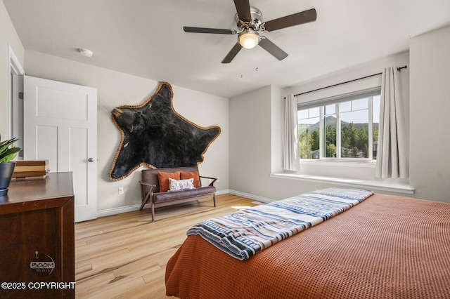 13378 Rosser Dr, Eagle River, AK 99577 - bedroom featuring wood finished floors and a ceiling fan