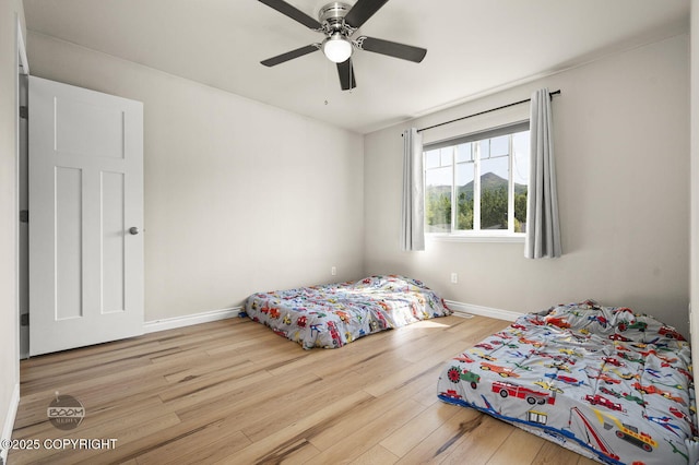 13378 Rosser Dr, Eagle River, AK 99577 - bedroom featuring wood finished floors and ceiling fan