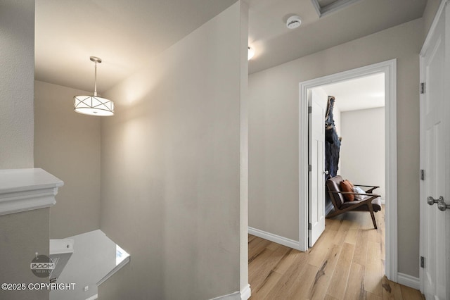 13378 Rosser Dr, Eagle River, AK 99577 - hallway featuring light wood-style floors and baseboards