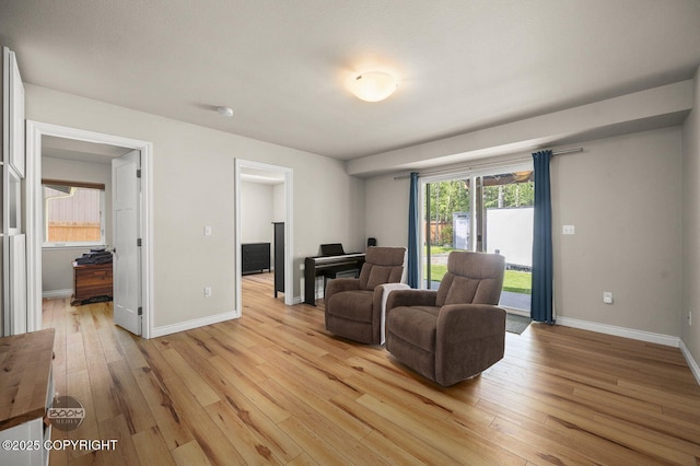 13378 Rosser Dr, Eagle River, AK 99577 - living area featuring light wood-style floors and baseboards