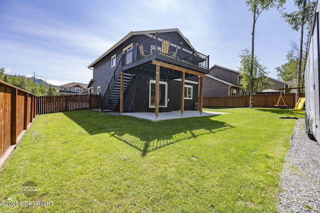 13378 Rosser Dr, Eagle River, AK 99577 - back of house featuring stairs, a fenced backyard, a patio, and a wooden deck