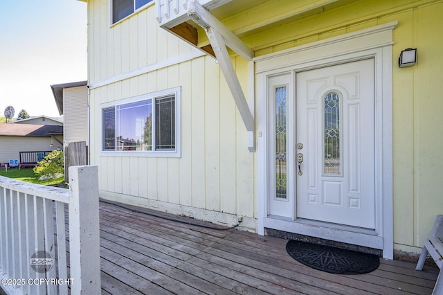 8100 E 20th Ave, Anchorage, AK 99504 - doorway to property featuring a wooden deck