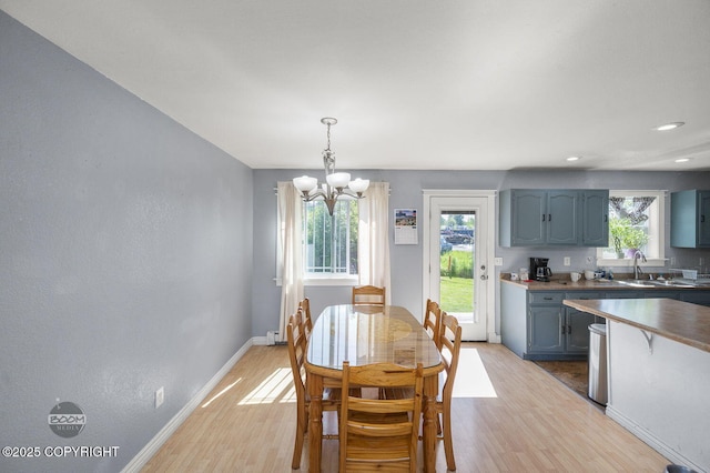 8100 E 20th Ave, Anchorage, AK 99504 - dining area with light wood-type flooring, a chandelier, and recessed lighting