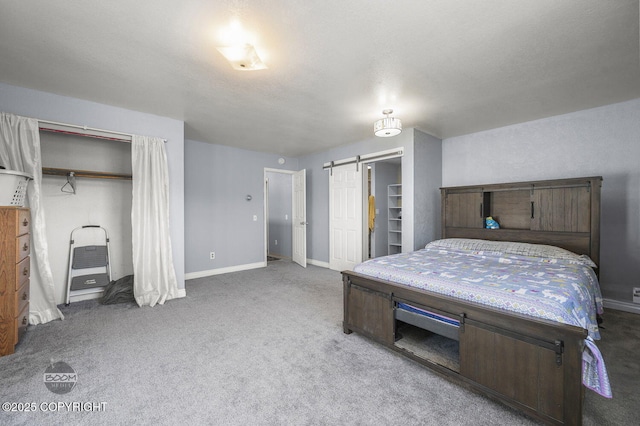 8100 E 20th Ave, Anchorage, AK 99504 - carpeted bedroom featuring baseboards and a barn door