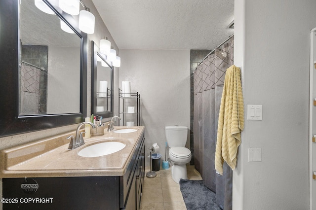 8100 E 20th Ave, Anchorage, AK 99504 - bathroom with a textured ceiling, double vanity, tile patterned floors, and a shower