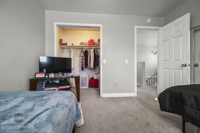 8100 E 20th Ave, Anchorage, AK 99504 - carpeted bedroom featuring a walk in closet and a closet