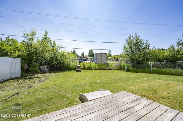8100 E 20th Ave, Anchorage, AK 99504 - view of yard featuring a deck