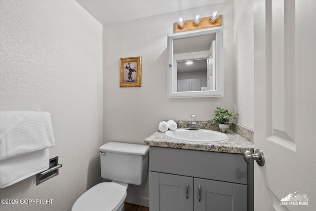 943 E 12th Ave # 6, Anchorage, AK 99501 - bathroom featuring vanity and toilet