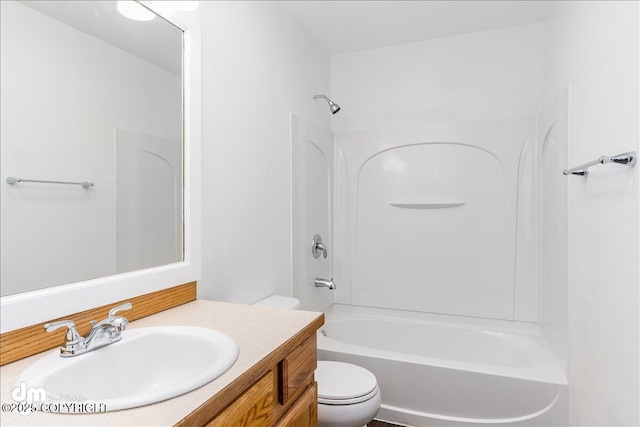 5621 Sapphire Loop Unit 18A, Anchorage, AK 99504 - bathroom featuring toilet, vanity, and bathtub / shower combination