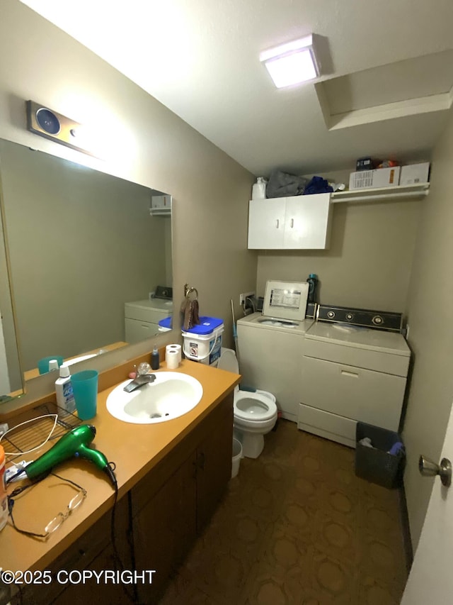 7766 Boundary Ave # G3, Anchorage, AK 99504 - bathroom with independent washer and dryer and vanity