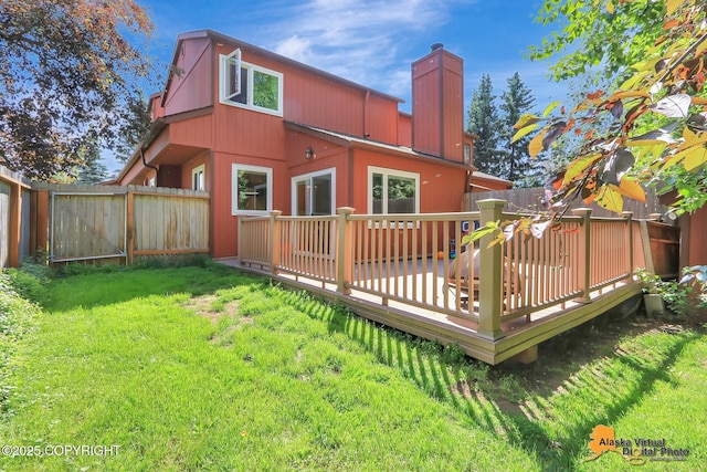 2003 Jamestown Cir, Anchorage, AK 99507 - rear view of property featuring a chimney, a fenced backyard, and a deck
