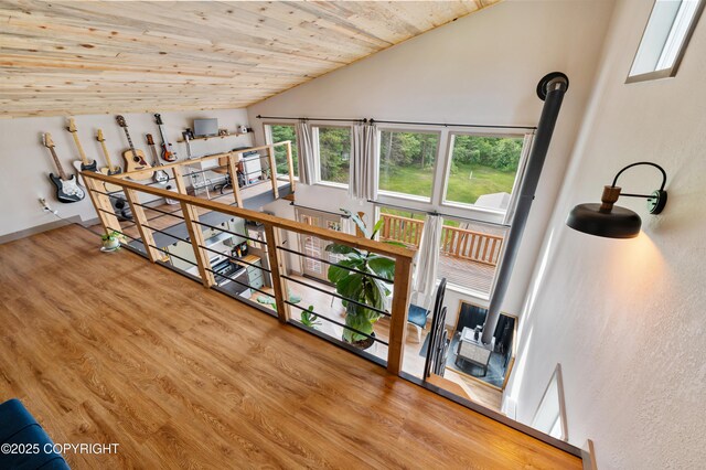 36339 Maria Rd, Homer, AK 99603 - unfurnished office featuring lofted ceiling, wooden ceiling, and wood finished floors