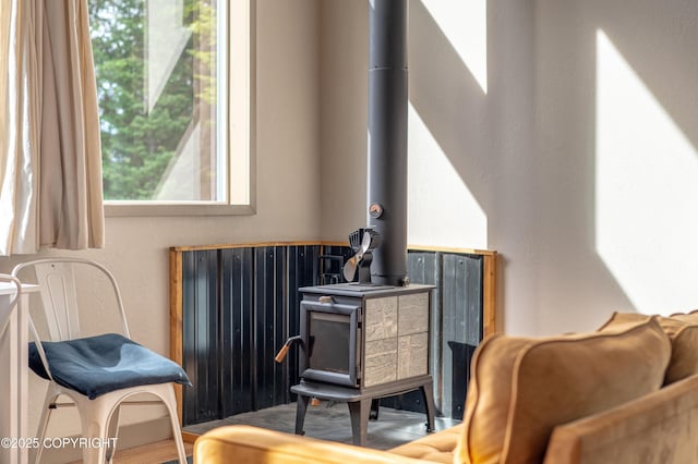 36339 Maria Rd, Homer, AK 99603 - living area featuring a wood stove and wood finished floors