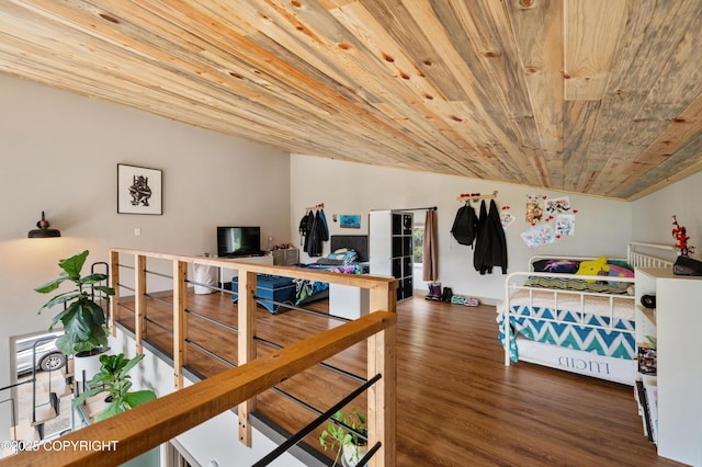 36339 Maria Rd, Homer, AK 99603 - bedroom featuring wooden ceiling, wood finished floors, and a desk