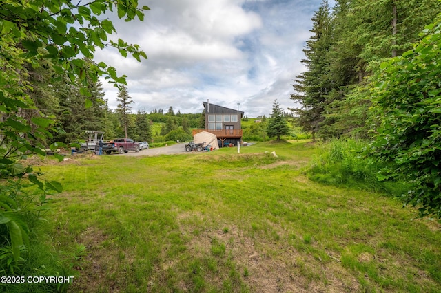 36339 Maria Rd, Homer, AK 99603 - view of grassy yard with a wooden deck