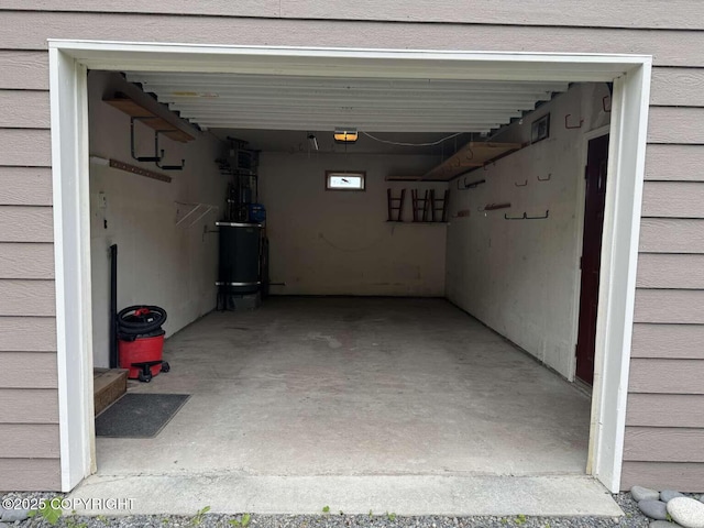 705 W Fairview Ave, Homer, AK 99603 - garage featuring a garage door opener