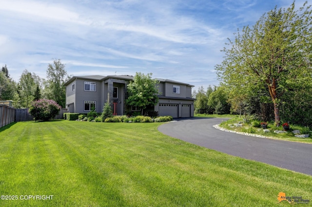 2842 Ensign Dr, Anchorage, AK 99515 - view of front of house with a garage and driveway