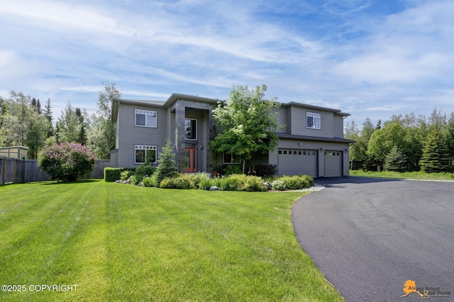 2842 Ensign Dr, Anchorage, AK 99515 - view of front of property with an attached garage and asphalt driveway