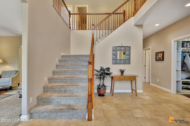2842 Ensign Dr, Anchorage, AK 99515 - stairs with recessed lighting and a towering ceiling