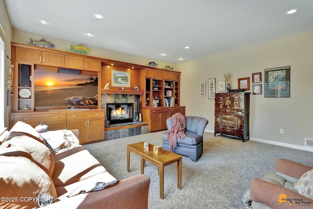 2842 Ensign Dr, Anchorage, AK 99515 - living room with light carpet, a tile fireplace, and recessed lighting