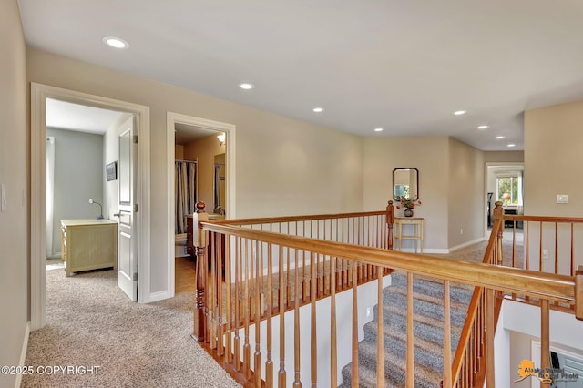 2842 Ensign Dr, Anchorage, AK 99515 - hall with an upstairs landing, light colored carpet, and recessed lighting