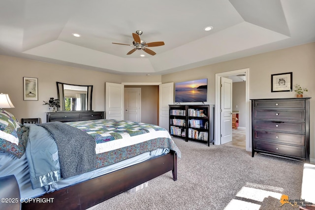 2842 Ensign Dr, Anchorage, AK 99515 - carpeted bedroom featuring a raised ceiling, recessed lighting, and a ceiling fan