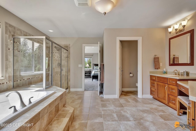 2842 Ensign Dr, Anchorage, AK 99515 - bathroom with a garden tub, a stall shower, vanity, and tile patterned floors
