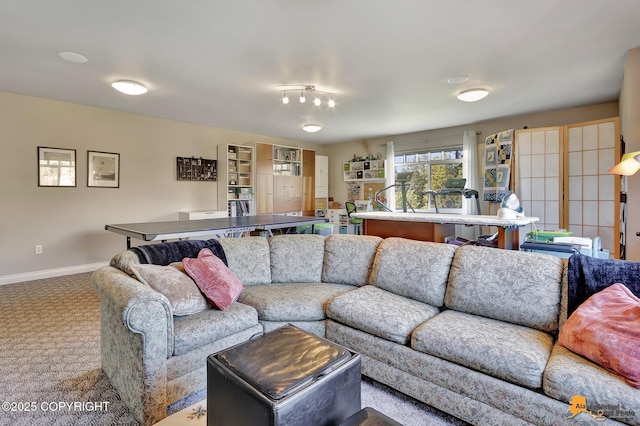 2842 Ensign Dr, Anchorage, AK 99515 - carpeted living room featuring baseboards
