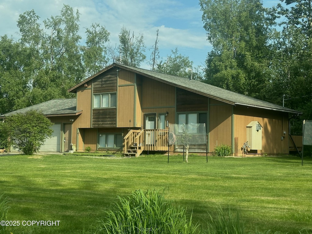 3091 N Longspur Dr, Wasilla, AK 99654 - rear view of house featuring a yard