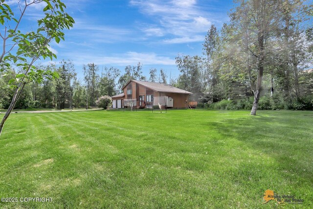 3091 N Longspur Dr, Wasilla, AK 99654 - view of green lawn