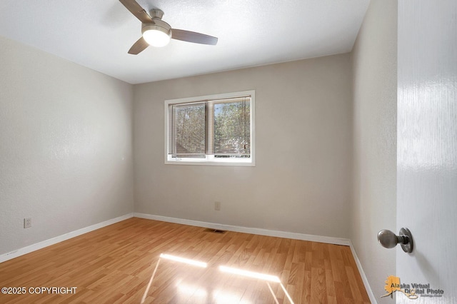 3091 N Longspur Dr, Wasilla, AK 99654 - empty room featuring light wood-style floors and ceiling fan