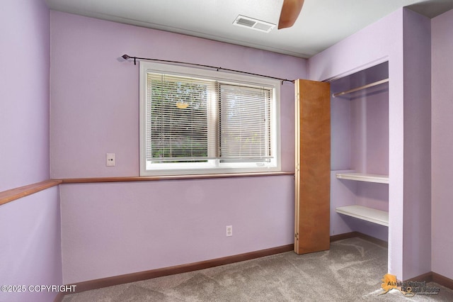 3091 N Longspur Dr, Wasilla, AK 99654 - unfurnished bedroom featuring carpet floors, a ceiling fan, and a closet