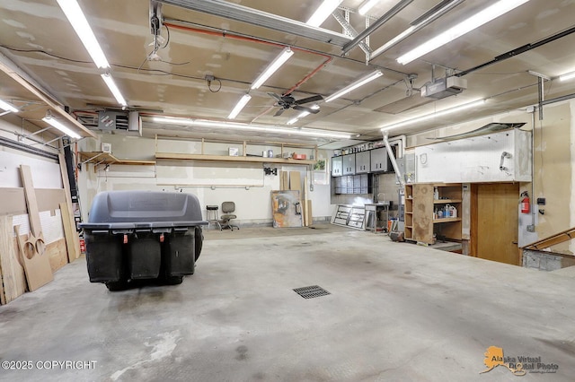 3091 N Longspur Dr, Wasilla, AK 99654 - garage featuring a garage door opener