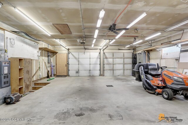 3091 N Longspur Dr, Wasilla, AK 99654 - garage featuring a garage door opener