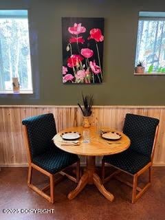 18905 Langille Rd, Cooper Landing, AK 99572 - dining space featuring plenty of natural light, a wainscoted wall, breakfast area, and wood walls