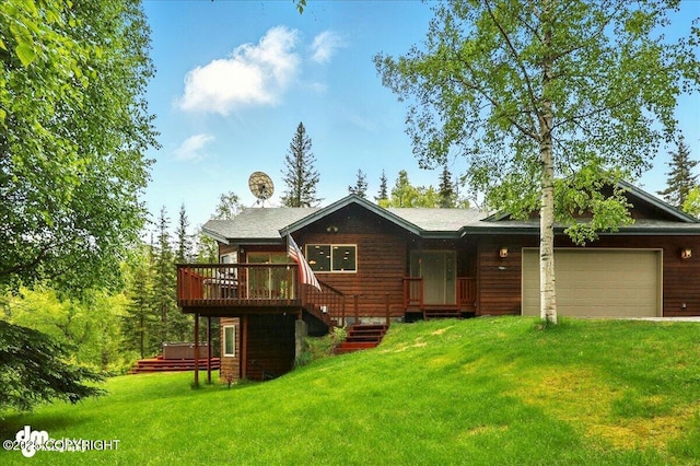 51137 Nanook Cir, Nikiski/North Kenai, AK 99611 - view of front of house with a garage, a front lawn, and a deck