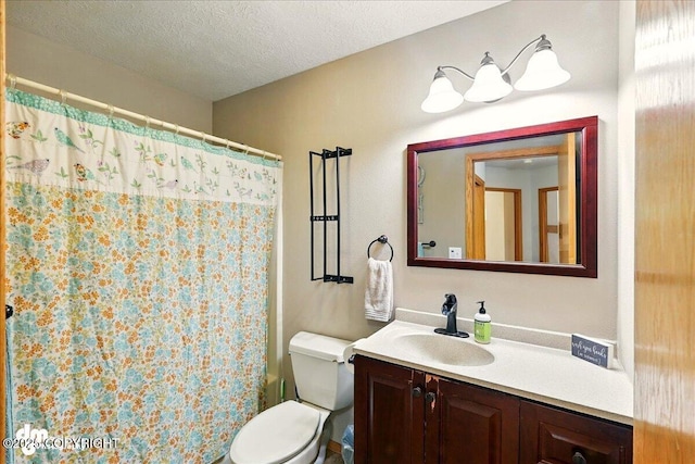 51137 Nanook Cir, Nikiski/North Kenai, AK 99611 - full bath featuring toilet, vanity, a textured ceiling, and a shower with curtain