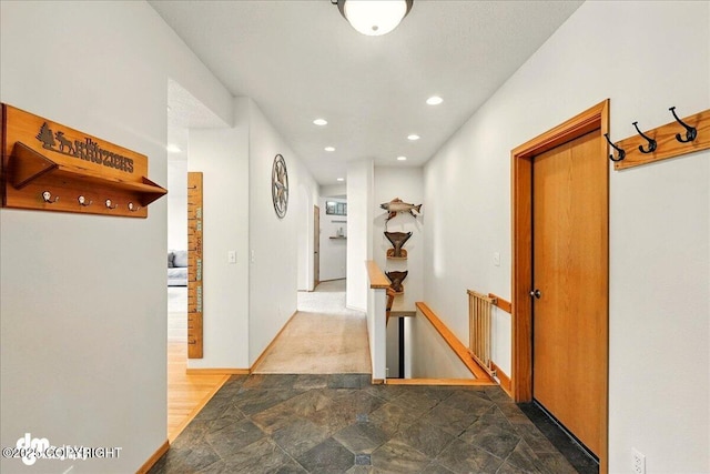 51137 Nanook Cir, Nikiski/North Kenai, AK 99611 - hallway with recessed lighting and stone finish floors