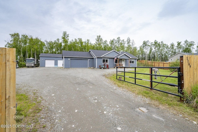 1169 W Trumpeter Swan Dr, Wasilla, AK 99623 - ranch-style home featuring an attached garage and driveway