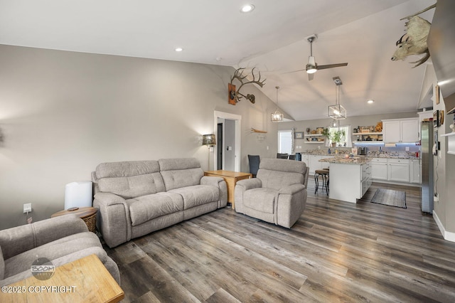 1169 W Trumpeter Swan Dr, Wasilla, AK 99623 - living room with ceiling fan, dark wood-type flooring, recessed lighting, and high vaulted ceiling