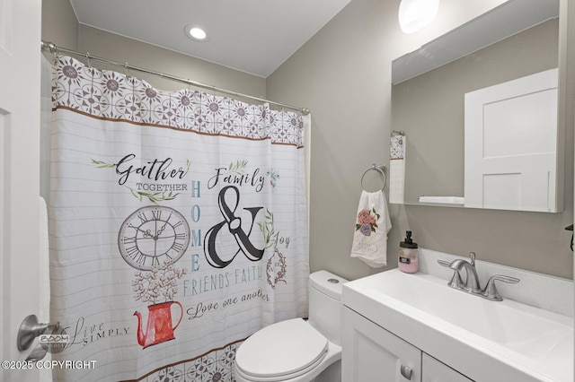 1169 W Trumpeter Swan Dr, Wasilla, AK 99623 - bathroom featuring toilet, vanity, recessed lighting, and a shower with shower curtain
